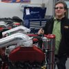 Doug in one of his shops with a jet engine for a boat they build on-site.