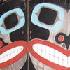 These colorful paintings are found on the entry doors to the lodge.