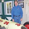 Patrick Kennedy has collected lots of 500-Mile race memorabilia, including photos, racing gear and the helmet worn by No. 34's driver.