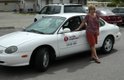 Burke with her 1999 Ford Taurus.