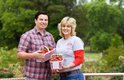 Matt Gallaher, executive chef at the Tennessee Residence, receives some local strawberries from Laura Sleigh of H & S Farms in Clarksville. Gov. Bill Haslam and First Lady Crissy Haslam have committed to using Tennessee grown and made products at the Tennessee Residence whenever possible.
