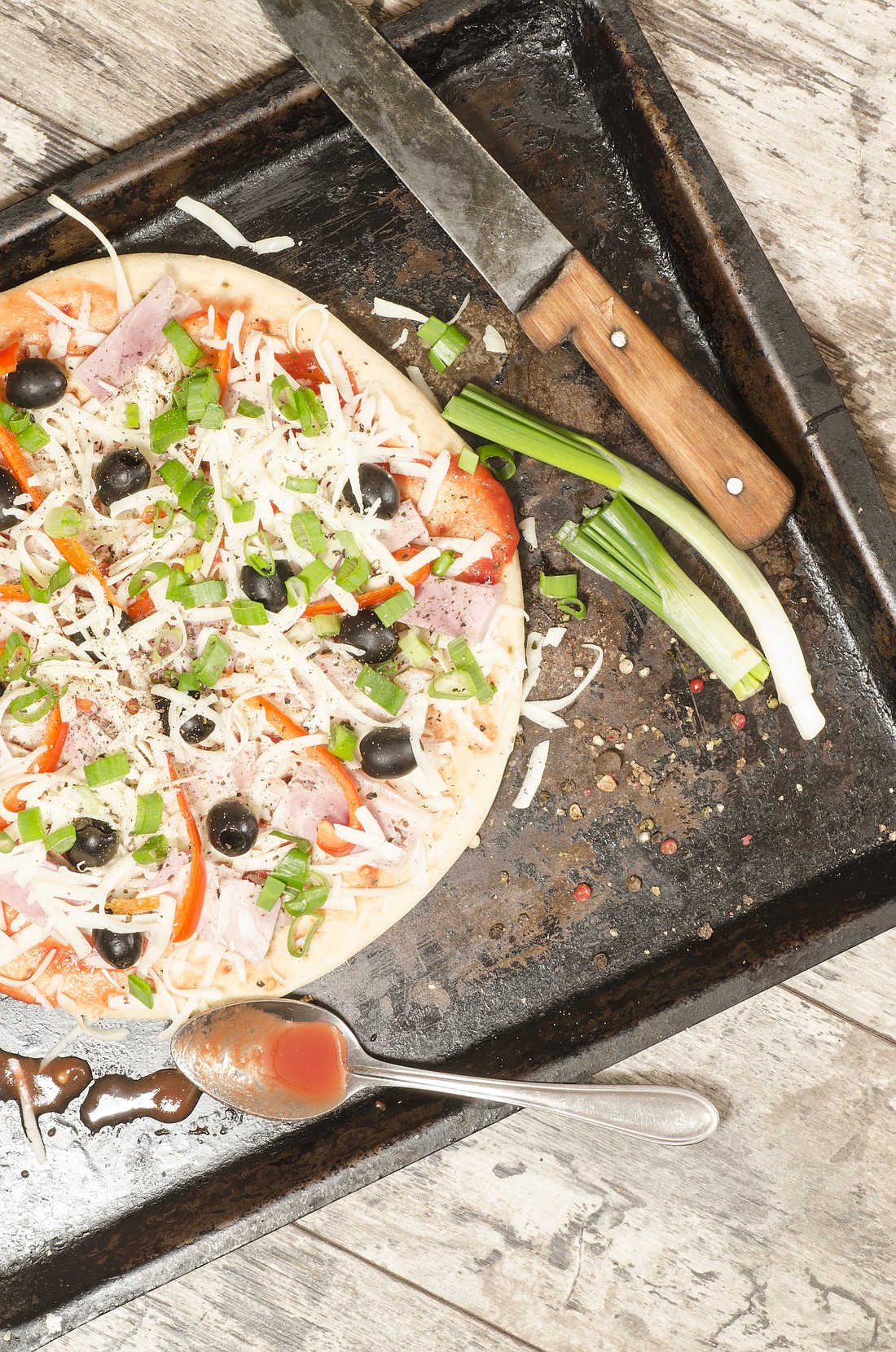 Making pizza from scratch at home is not only easy, but it's heart- and kidney-healthy as well.
