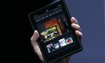 Amazon CEO Jeff Bezos holds up the new Kindle Fire at a news conference during the launch of Amazon's new tablets in New York, September 28, 2011. REUTERS/Shannon Stapleton