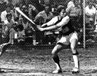 Judy Schneider readies for the pitch when she played outfield with the St. Louis Hummers semi-professional, fast pitch softball team.