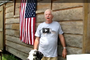 Lumberjack barn builder recycles trees into lumber