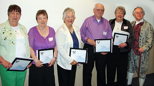 Snohomish County Retired and Senior volunteers were honored with lifetime service awards at the RSVP volunteer recognition event held in May. Pictured left to right are Martha Mee of Everett, Nora McCaffrey of Monroe, Barbara Halseth of Edmonds, Bob Krull of Granite Falls and Janet Young of Lynnwood. "Ben Franklin," who gave a speech on volunteerism at the event, is pictured on the far right.