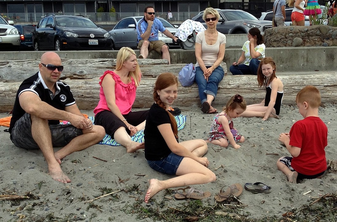 Here's the family enjoying the Edmonds beach, a short walk from downtown. Barbara is sitting on the log. In front of her are, from the left, son-in-law Ed, daughter Misha, granddaughters Mia, Talula, Bella, and far right, grandson Max.