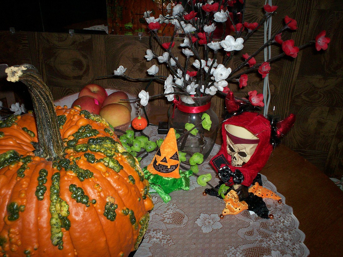 Magical Halloween decor, including a really warty pumpkin.