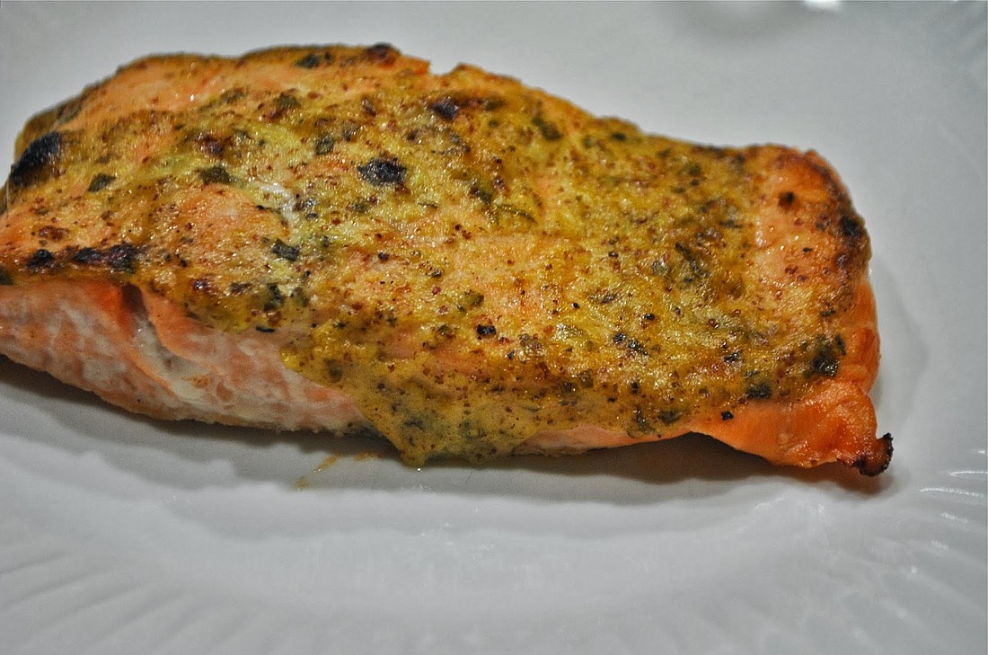 Baked salmon with mustard sauce and tarragon.