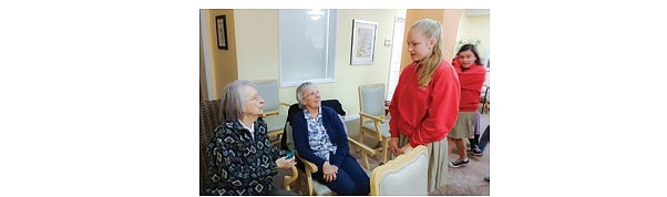 Once a month St. Brendan Parish School students visit Chateau Bothell Landing, arriving with smiles and bringing joy to the residents