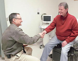 Dr. Douglas Grier of Sound Urological Associates of Edmonds with John, the very first patient in the Pacific Northwest to have the prostratic urethral lift