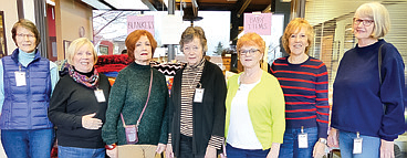 Knit-It-All volunteers (l-r) Sarah Parkhurst, Sue Haley, Charla Sullivan, Pat Loftin, Cheryl Larson, Bari Clemons and Cindy Etter