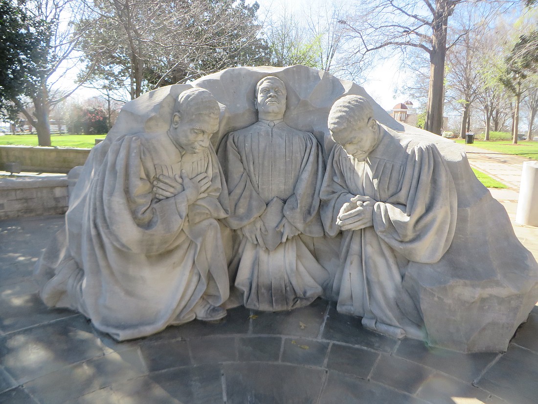 Sculpture of praying ministers at Kelly Ingram Park.
Photo by Debbie Stone