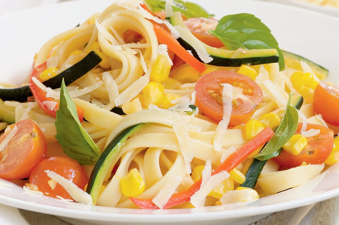 Spring vegetables add a pop of color and flavor to homemade fettuccine. 