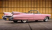 Both Elvis and Aretha had pink Cadillacs.
