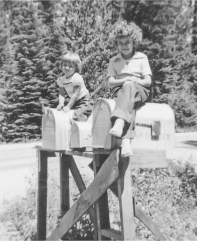 Janet (right) and her little sister Karen
enjoyed helping their father with his rural
mail delivery route in Eastern Washington