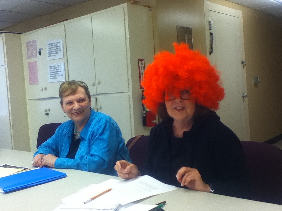 Pat Jordan in a clown wig having fun at Write About Your Life class.