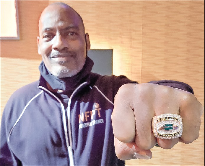 Seattle’s own Mark Bryant shows off his Hall of Fame ring. He is a two-time Hall of Famer and an eight-time Powerlifting World Champion. Photo by Preston Rick.