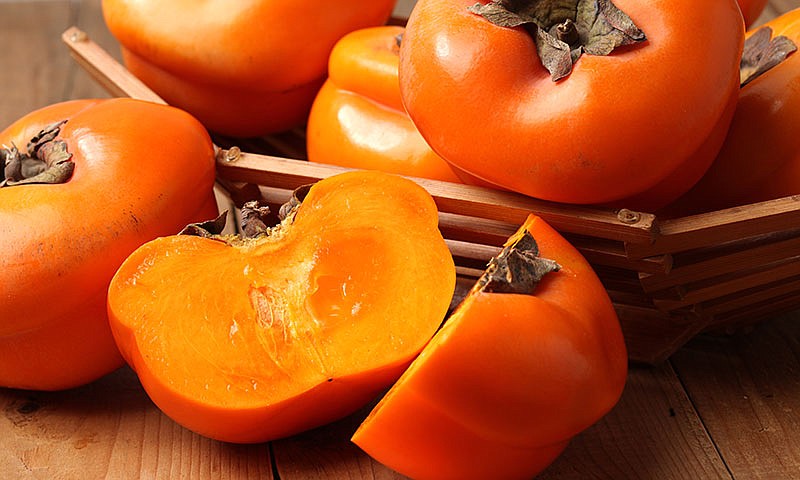 Like bright orange lanterns, persimmons add zing and flavor to winter salads and desserts.
