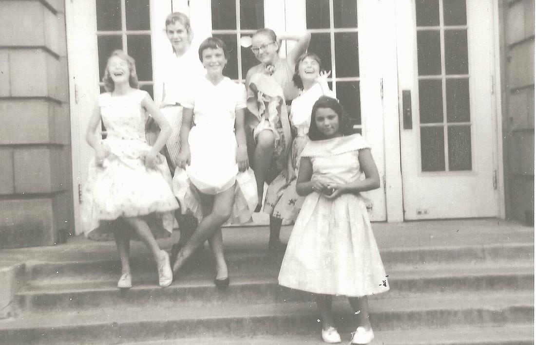 "The Girls" last day 7th grade, 1958, Morgan Jr Hi, Ellensburg, WA April is in the center, legs crossed.