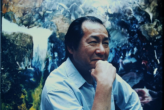 A 1989 photo of Seattle artist Victor Kai Wang, now 88, who worked most of his life largely under the radar. His work is now on view at the Wing Luke Museum. (Courtesy of Lele Barnett)