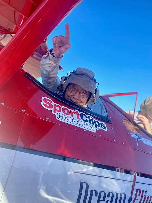 Local seniors took flights in an open cockpit bi-plane with Dream Flights, which honors veterans
