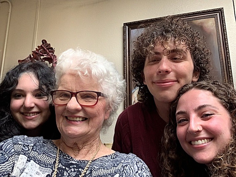 Zabine Van Ness with college students at the Unity Museum in Seattle's University District