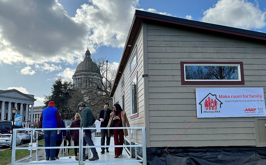 A model Accessory Dwelling Unit (ADU) is set up near the Legislative Building dome in Olympia to bring attention to new legislation to support flexible housing options