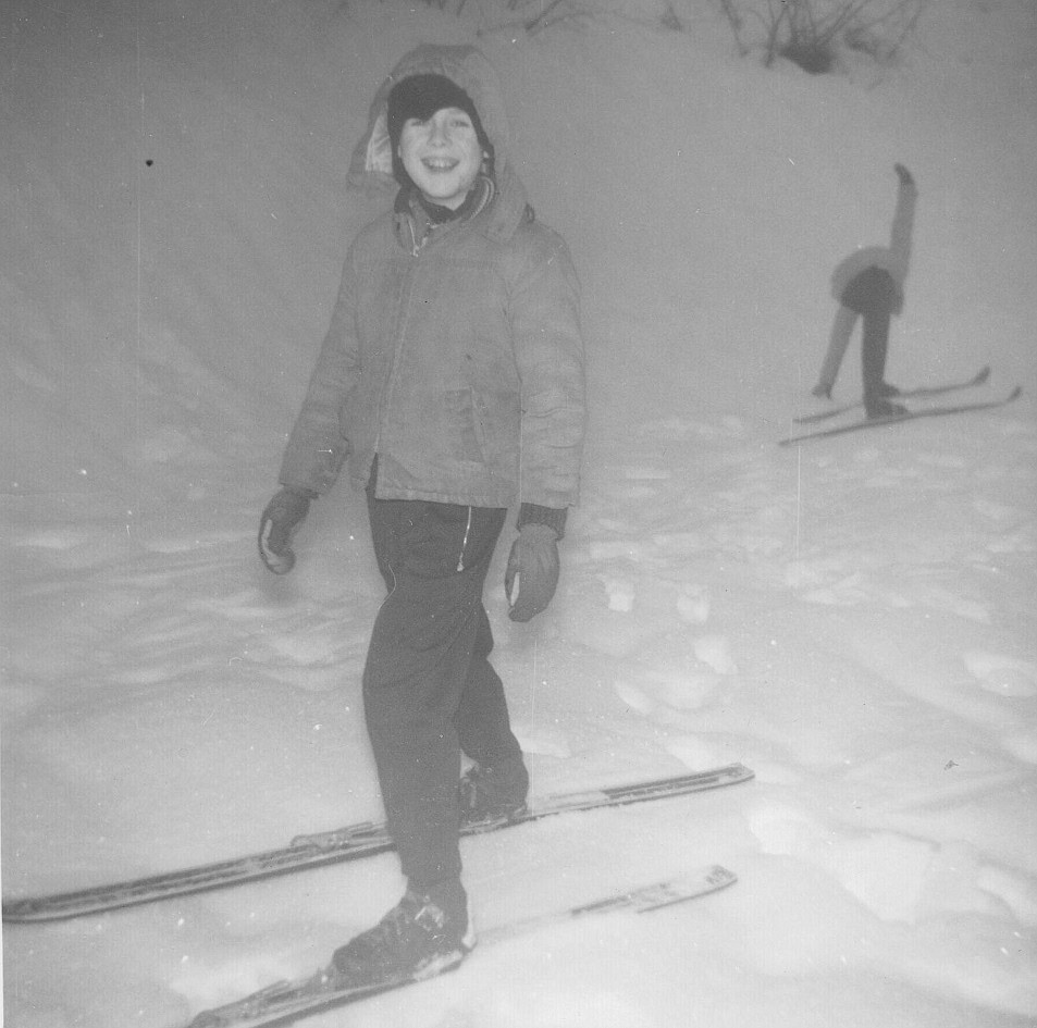 This 1962 photo was taken on Shifter's Hill in Burke, Idaho, showing the author on his first set of skis with sister, Sue, in the background.