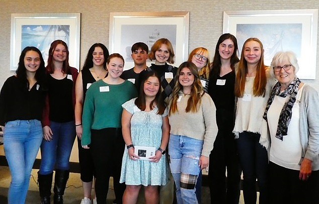 Residents at Heron's Key senior living community raised $20,000 for scholarships and other good works. Here is a photo of last year's scholarship winners, with Marilyn Colyar (far right), who heads the resident scholarship and community engagement groups at the community.