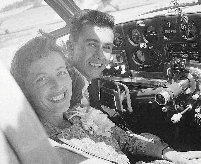 Pat D'Amico and her husband on their wedding day. They were about ready to take off for their honeymoon in his airplane.