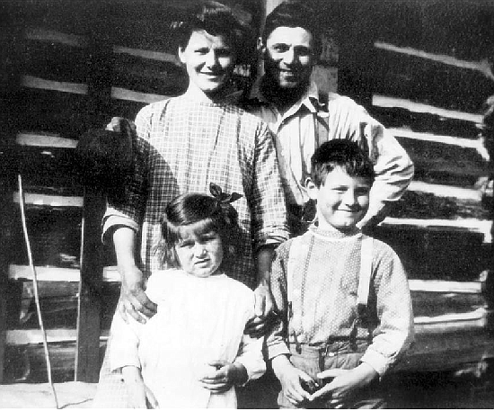 Dorothea's parents, sister and brother in front of their log cabin home in Tiger, Washington, 1913. Photo courtesy Dorothea Nordstrand