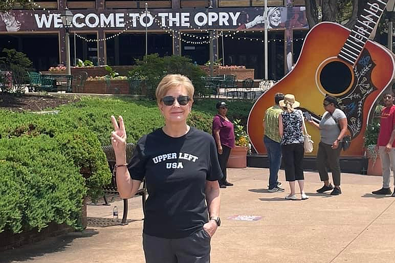 Margaret Larson in front of the Grand Ole Opry before a recent Jackon Browne concert, wearing her ‘Upper Left USA’ t-shirt. "#PNWForever," she writes.