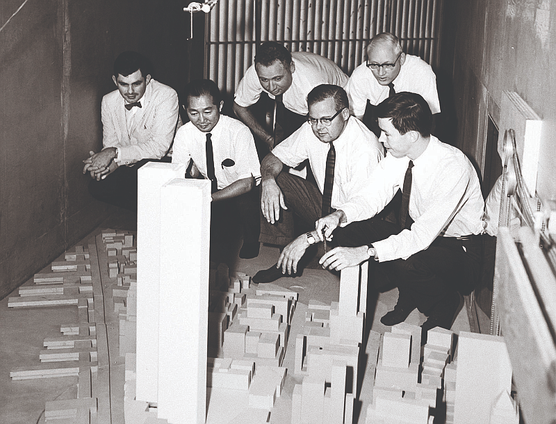 Sixty years ago this month, Seattle-trained architect Minoru Yamasaki (second from left) and his engineering team were racing to finish the design for the World Trade Center’s twin towers for a public unveiling in January 1964.