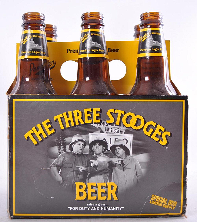 The author was thrilled to find a relic in the refrigerator: an unopened bottle of The Three Stooges Beer