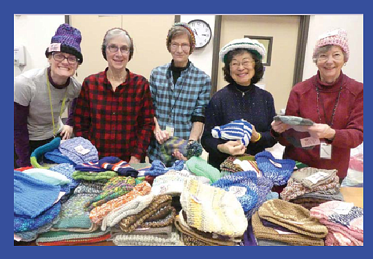Knitting or sewing warm clothing for people who need them is one of the many volunteer opportunities available through the Retired & Senior Volunteer program. Pictured here is King County RSVP Coordinator Megan Wildhood with 2021 Knit-It-Alls (KIA) volunteers, photo courtesy of Solid Ground’s King County RSVP "Experience in Action" Newsletter.