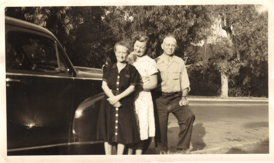 This is my grandmother with a couple of other relatives. She is the short one in front.