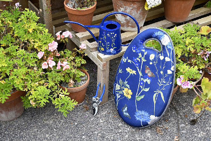 Decorative kneelers or knee pads, pruners and watering cans are practical gifts for any gardener, photo courtesy of Burgon & Ball