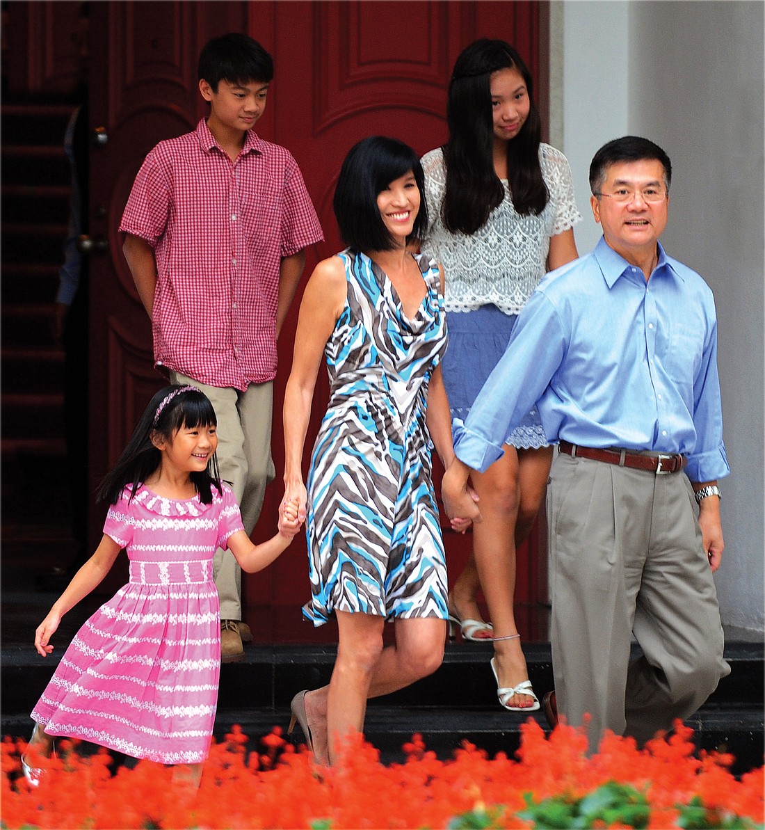 Washington State’s former first family has made a splash in China, where Gary Locke serves as ambassador. Gary Locke and his wife Mona  greet the press with their children (l-r) Madeline (aged 6), Dylan (12) and Emily (14) in the courtyard of their new home in Beijing