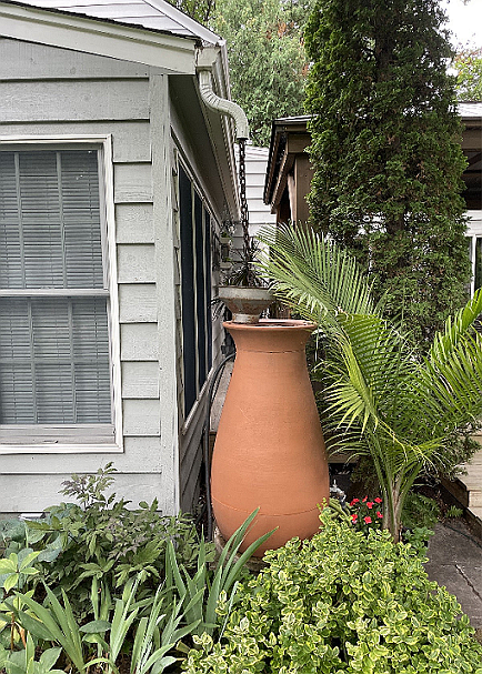 Rain barrels can help manage the water on your property and provide water to use in your gardens, photo courtesy of MelindaMyers.com