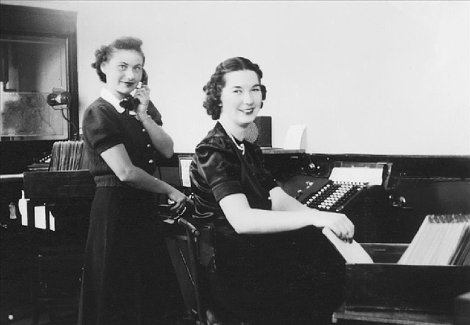 Dorothea and Eva Larson at Burroughs bookkeeping machines at Green Lake State Bank, Seattle, ca. 1934. Photo courtesy of the Nordstrand family.